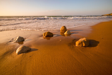 Fototapeta na wymiar beautiful landscape with a brown sandy beach in Malta
