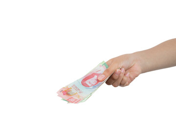 outstretched arm holding banknotes in hand, making the gesture of paying, with white background and...