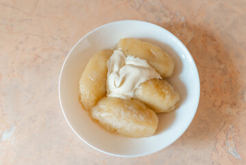 Traditional Lithuanian dish meal cuisine, stuffed meat potato dumpling,most popular Lithuanian national dish on a plate.
