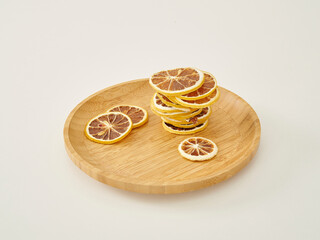 Dry fruit on the white background style, in the wooden cup isolated.
