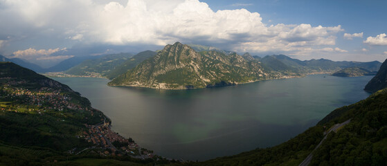 Panorama at Lake Iseo and Mount Corna Trentapassi at sunny day with clouds. Bergamo, Lombardy,...