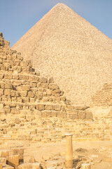 Fototapeta na wymiar The pyramids at Giza, together with the Sphinx and smaller tombs, are among the most significant attractions in the world
