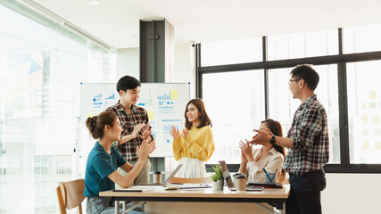 Young Asian Start up new business working together to success a new project in creative office.