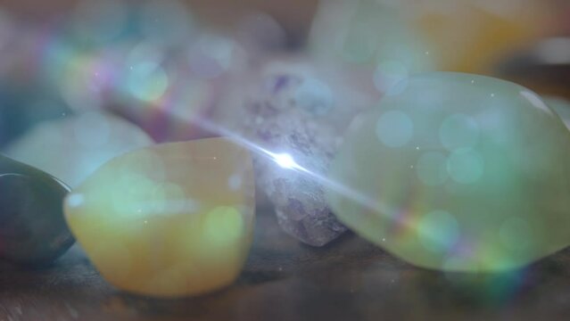 Animation of stars moving over stones on wooden surface