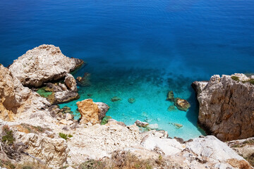 Hypnotic seascape view with white rocks and deep blue, turquoise sea water. North-eastern side of...