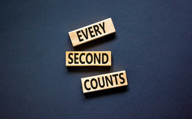 Every second counts symbol. Concept words Every second counts on wooden blocks on a beautiful black...