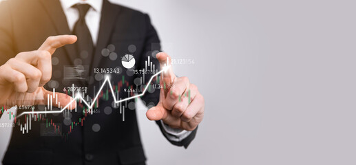 Hand hold sales data and economic growth graph chart. Business planning and strategy. Analysing trading of exchange. Financial and banking. Technology digital marketing.Profit and growing plan.