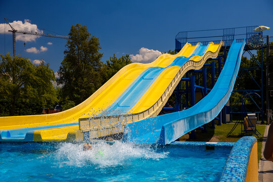 Yellow and blue color water slide in aquapark