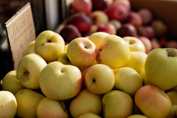 Yellow apples on the counter of a street grocery store