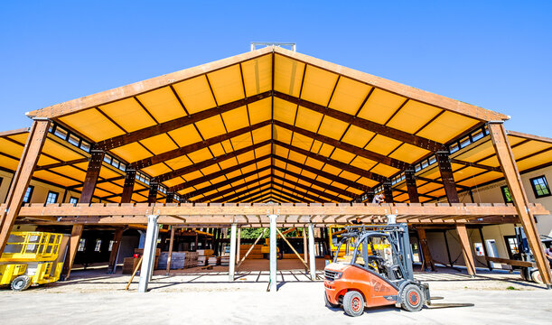 Munich, Germany - July 19: building up the annual worlds largest folk festival oktoberfest (wiesn) with big beerhalls on the theresienwiese in munich on July 19, 2022