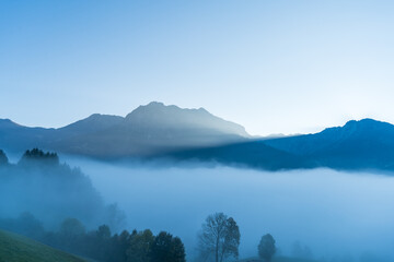 Beautiful sunrise in the mountains - bright fresh morning in the alps.