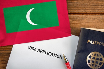 Visa application form, passport and flag of Maldives