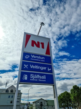 An Icelandic petrol station of the company Orkan - company logos and petrol prices in Icelandic landscape