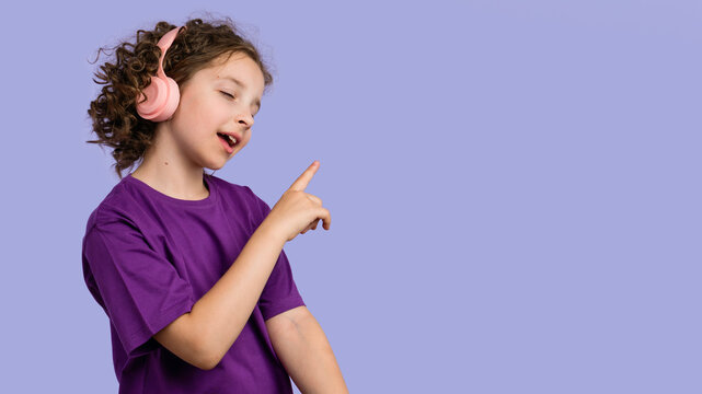 Girl listening music on headphones