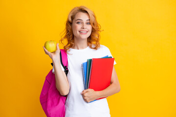 Portrait of smiling young woman student in shirt backpack hold notebooks. Education in high school university college.