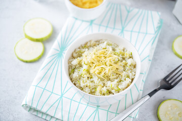 Zucchini cheese rice in a bowl