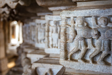 Carved warriors inside of the Adinatha temple,  a Jain temple in Ranakpur, Rajasthan, India, Asia