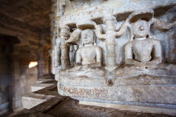 Fototapeta na wymiar Rich decorated interior of the Adinatha Temple, a Jain temple in Ranakpur, Rajasthan, India, Asia
