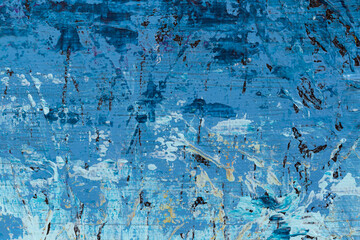 Macro close-up of an abstract blue, white and black acrylic paint background. High resolution full...