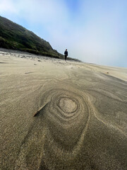 woman walking on the beach