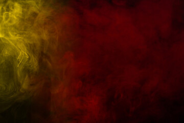 Yellow steam on a black background.