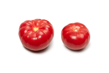 Red fresh tomato isolated on white background.