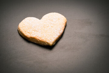 Shortbread in the shape of a heart isolated on white background.