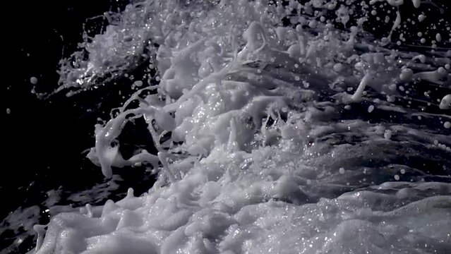 Sea foam slow motion closeup