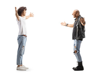 Obraz premium Full length profile shot of a young man meeting a punk with arms wide open