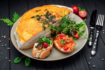 Poulard omelet with different bruschettas