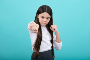 Fototapeta premium Angry face, upset emotions of teenager girl. Angry portrait young girl having nervous breakdow. Negative kids emotions facial expressions feelings, bad attitude.