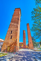 Large Leonardo da Vinci square boasts great medieval three towers, Pavia, Italy
