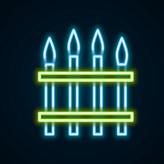 Glowing neon line Classic iron fence with metal pillars icon isolated on black background. Ancient wrought iron fence. Colorful outline concept. Vector