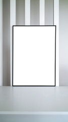 Modern panel on table of office room. Minimalist black frame mockup for design