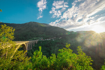 Famous bridge on the Tara river in Montenegro or Crna gora in ev - obrazy, fototapety, plakaty