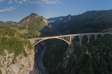 Famous bridge on the Tara river in Montenegro or Crna gora in ev - obrazy, fototapety, plakaty