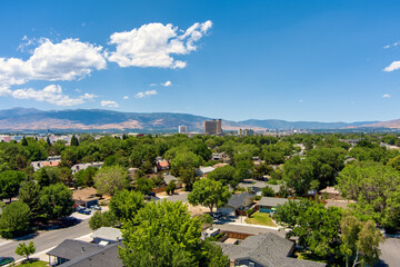 Aerial view of the Reno-Sparks Nevada downtown skyline district during summer with mature green...
