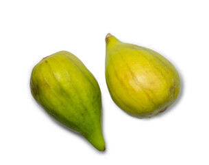 Green fresh figs on a white background. Fig fruit on a cutting board.   The fruit of a subtropical...
