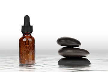 Medicinal product in a bottle with a dropper, mock-up. Balance and harmony, concept. Minimal