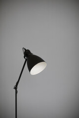 Black lamp on a gray background