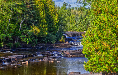 Fototapeta na wymiar Countless waterfalls of various kinds on the river - Trowbridge Falls, Thunder Bay, ON, Canada