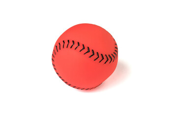 Rubber dog toy in the shape of a baseball isolated on a white background.