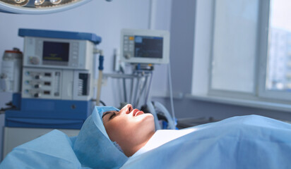Man surgeon at work in operating room