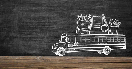 School bus with stationery drawn on blackboard