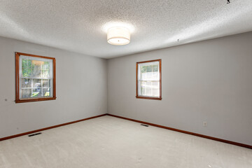 Modern Efficiency: Short-Term Rental with White Cabinets, Wood Floors, and Open Floor Plan