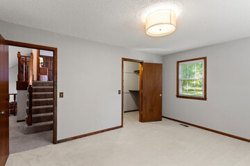 Modern Efficiency: Short-Term Rental with White Cabinets, Wood Floors, and Open Floor Plan