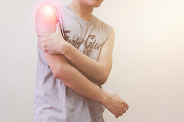 Man suffering from shoulder pain on white background, health problem and people concept