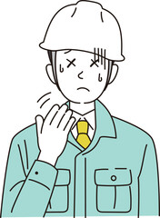 暑さで手であおぐ作業員
