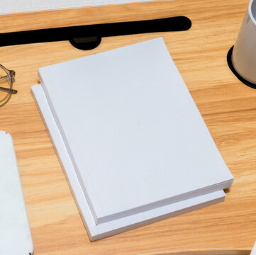 Mockup image of two books with white blank cover