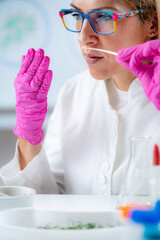 Naklejka premium Smelling Fragrance on Perfume Test Paper in the Lab.